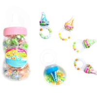 Lizak smoczek z cukierkami w butelce - skarbonce Opakowanie 9g x 60szt